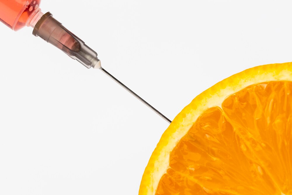 Orange injected with gmo chemicals