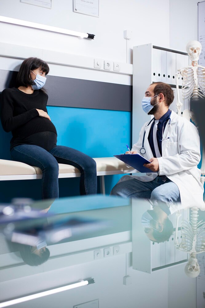 Pregnant lady and doctor discuss results